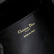Noir Cannage Quilted Leather Drawstring Backpack