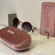 Miu Miu Round Gold Frame Sunglasses