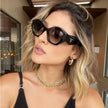 Prada Oversized Curved Cat-Eye Sunglasses – PR 08YS Style